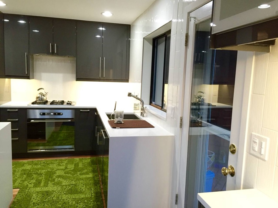 After: Kitchen with dark gray cabinets